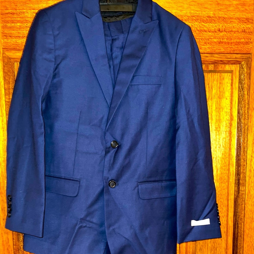 Brand New with tags. Calvin Klein Size 16 Blue Suit